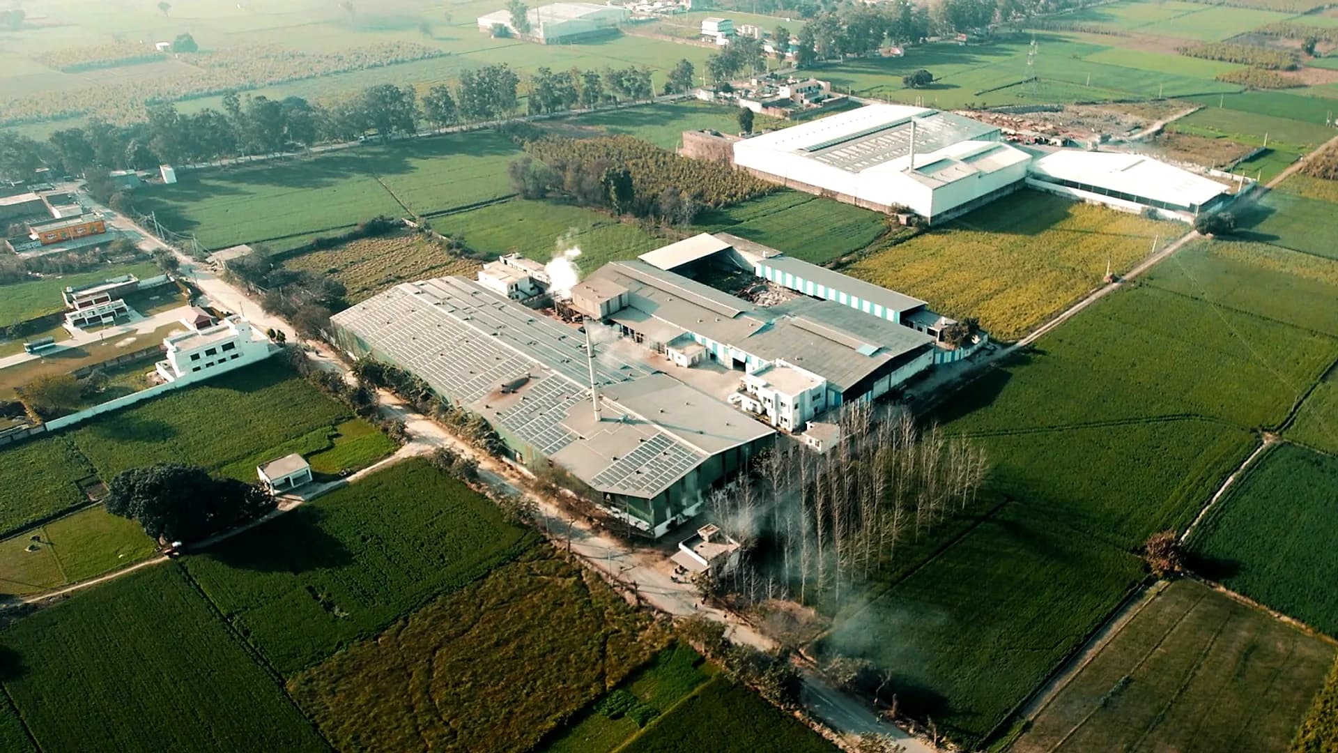 Aerial view of the Artis Laminates facility amid the fields of Marupur, Yamunanagar